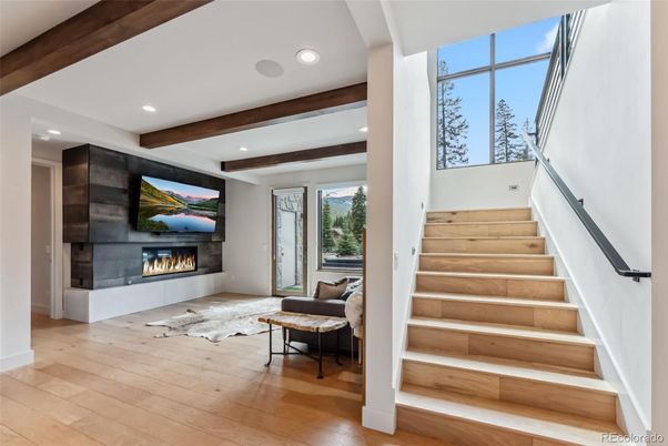 Fireplace, Interior, Living room, Recessed Lighting, Wooden Beams, Wood Texture Flooring