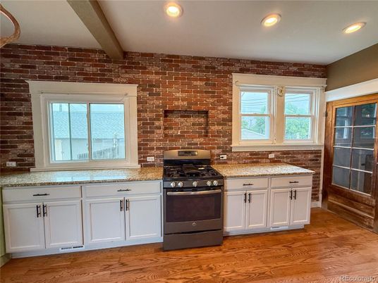 Interior, Kitchen, Recessed Lighting, Stainless Steel Appliances, Stone Walls, Wood Texture Flooring