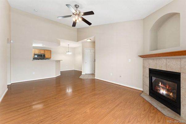 Chandelier, Empty room, Fireplace, Interior, Kitchen, Pendant Lights, Wood Texture Flooring