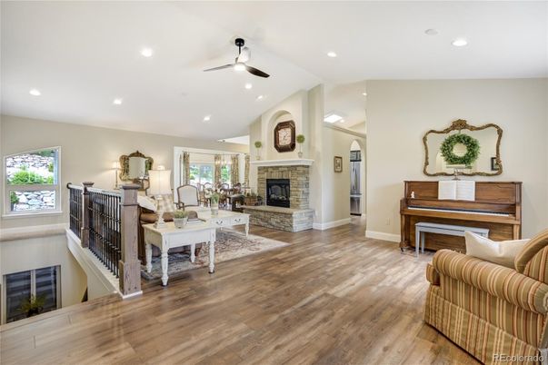 Fireplace, Interior, Living room, Piano, Recessed Lighting, Wood Texture Flooring