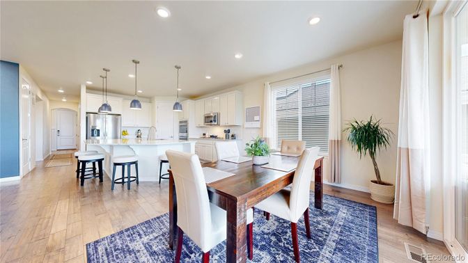 Dining room, Interior, Kitchen, Pendant Lights, Recessed Lighting, Stainless Steel Appliances, Wood Texture Flooring