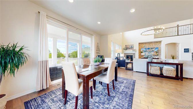 Dining room, Fireplace, Interior, Living room, Pendant Lights, Recessed Lighting, Wood Texture Flooring