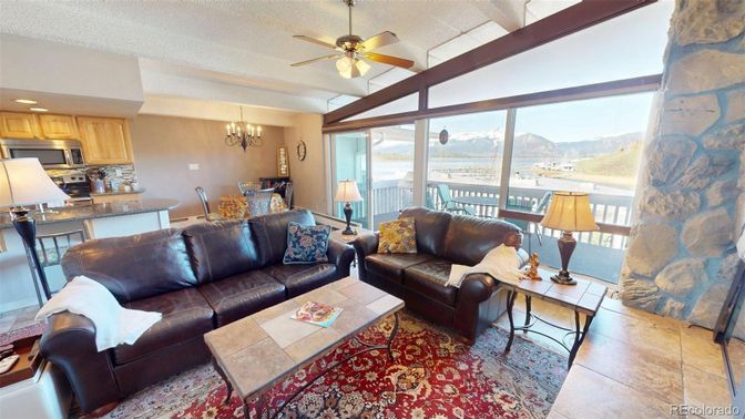 Chandelier, Dining room, Interior, Kitchen, Living room, Recessed Lighting, Stainless Steel Appliances, Stone Walls, Water