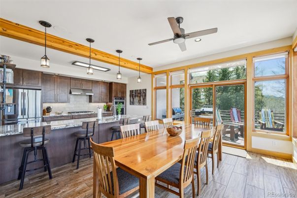 Dining room, Interior, Kitchen, Pendant Lights, Recessed Lighting, Stainless Steel Appliances, Wood Texture Flooring