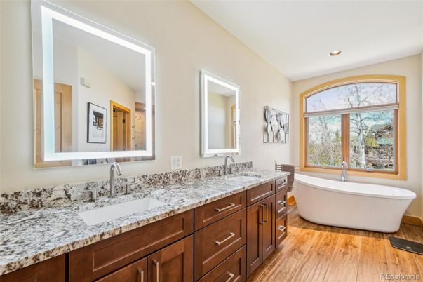 Bathroom, Dual Sink Vanities, Free Standing Baths, Interior, Recessed Lighting, Wood Texture Flooring