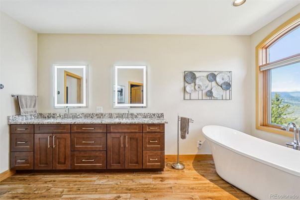 Bathroom, Dual Sink Vanities, Free Standing Baths, Interior, Recessed Lighting, Wood Texture Flooring