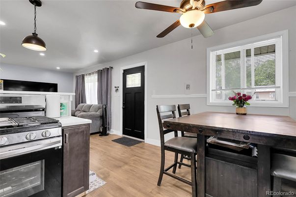 Dining room, Interior, Kitchen, Pendant Lights, Recessed Lighting, Stainless Steel Appliances, Wood Texture Flooring