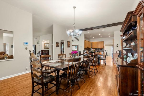 Chandelier, Dining room, Fireplace, Interior, Kitchen, Recessed Lighting, Wood Texture Flooring