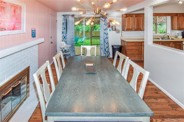 Dining room, Fireplace, Interior, Pendant Lights, Wood Texture Flooring