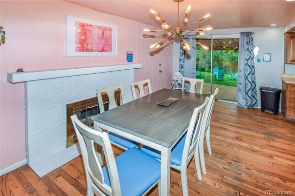 Dining room, Fireplace, Interior, Pendant Lights, Wood Texture Flooring