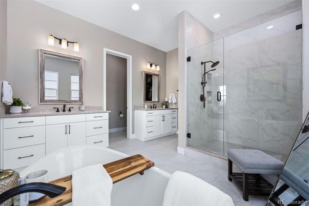 Bathroom, Dual Sink Vanities, Glass Shower, Interior, Marble, Marble Walls, Recessed Lighting