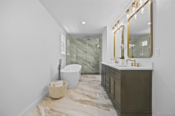 Bathroom, Dual Sink Vanities, Free Standing Baths, Glass Shower, Interior, Marble, Marble Walls, Recessed Lighting