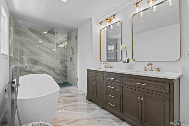 Bathroom, Dual Sink Vanities, Free Standing Baths, Glass Shower, Interior, Marble, Marble Walls, Recessed Lighting