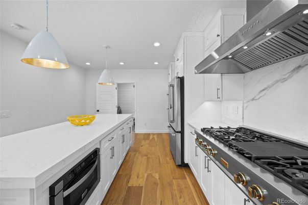 Interior, Kitchen, Pendant Lights, Recessed Lighting, Stainless Steel Appliances, Wood Texture Flooring