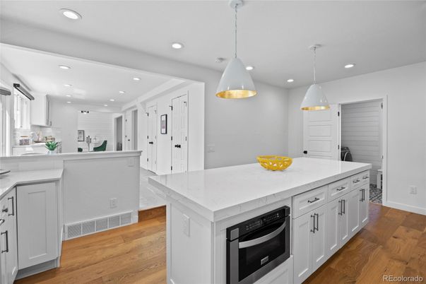 Interior, Kitchen, Pendant Lights, Recessed Lighting, Stainless Steel Appliances, Wood Texture Flooring
