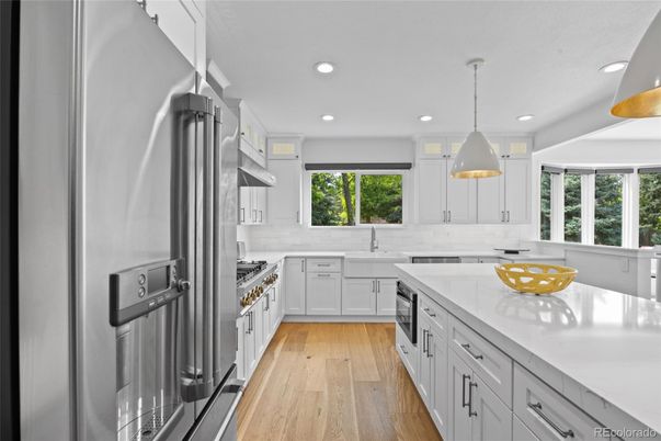 Interior, Kitchen, Pendant Lights, Recessed Lighting, Stainless Steel Appliances, Wood Texture Flooring