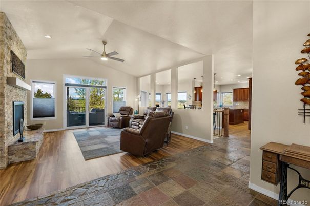 Fireplace, Interior, Kitchen, Living room, Recessed Lighting, Stone Walls, Wood Texture Flooring