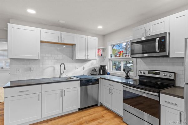 Interior, Kitchen, Recessed Lighting, Stainless Steel Appliances, Wood Texture Flooring