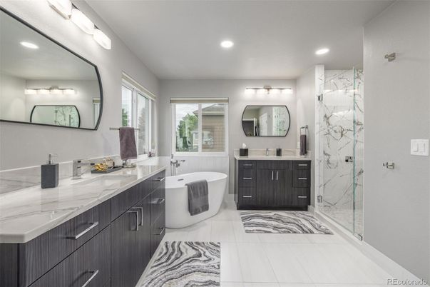 Bathroom, Dual Sink Vanities, Free Standing Baths, Glass Shower, Interior, Marble, Marble Walls, Recessed Lighting