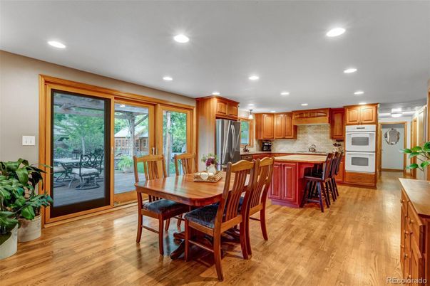 Dining room, Interior, Kitchen, Recessed Lighting, Stainless Steel Appliances, Wood Texture Flooring