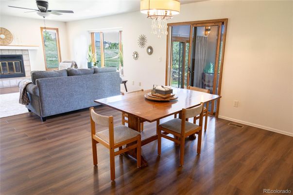 Chandelier, Dining room, Fireplace, Interior, Living room, Wood Texture Flooring