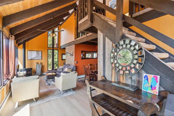 Dining room, Fireplace, Interior, Living room, Pendant Lights, Wooden Beams, Wood Texture Flooring