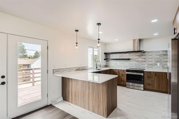 Interior, Kitchen, Pendant Lights, Recessed Lighting, Stainless Steel Appliances, Wood Texture Flooring