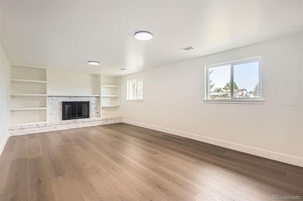 Empty room, Fireplace, Interior, Recessed Lighting, Wood Texture Flooring