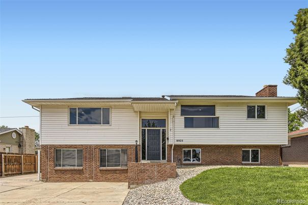 Exterior, Facade, Brick Facade, Raised Ranch