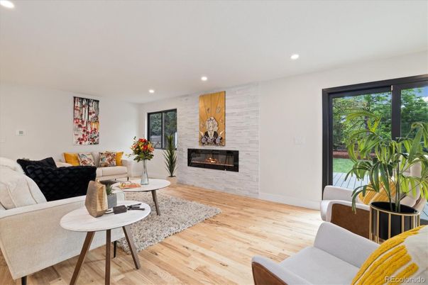 Fireplace, Interior, Living room, Recessed Lighting, Stone Walls, Wood Texture Flooring