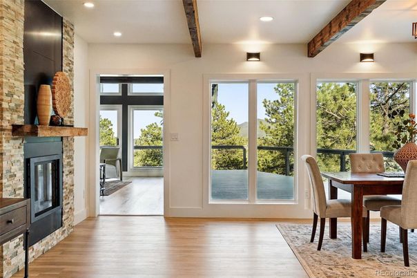 Dining room, Fireplace, Interior, Recessed Lighting, Stone Walls, Wooden Beams, Wood Texture Flooring