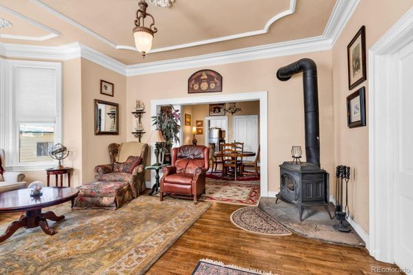 Dining room, Fireplace, Interior, Pendant Lights, Wood Texture Flooring