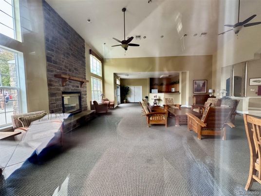 Dining room, Fireplace, Interior, Living room, Recessed Lighting, Stone Walls
