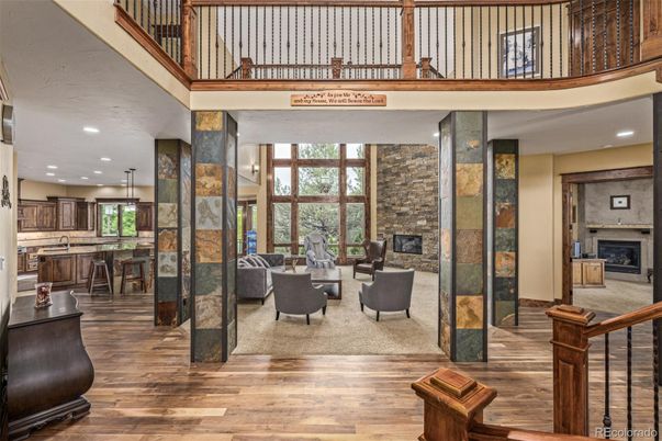 Fireplace, Interior, Living room, Pendant Lights, Recessed Lighting, Stone Walls, Wood Texture Flooring