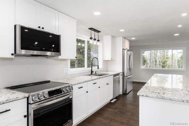 Interior, Kitchen, Pendant Lights, Recessed Lighting, Stainless Steel Appliances, Wood Texture Flooring