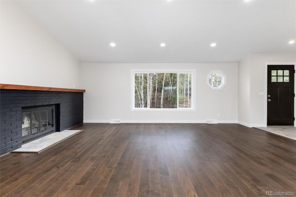 Empty room, Fireplace, Interior, Recessed Lighting, Wood Texture Flooring