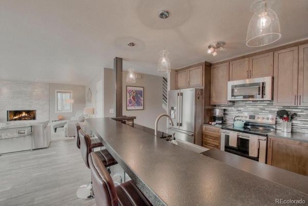 Fireplace, Interior, Kitchen, Pendant Lights, Stainless Steel Appliances