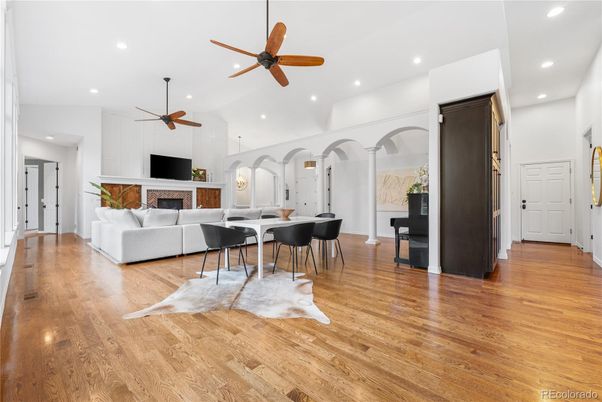 Dining room, Fireplace, Interior, Living room, Recessed Lighting, Wood Texture Flooring