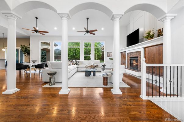 Dining room, Fireplace, Interior, Living room, Recessed Lighting, Wood Texture Flooring