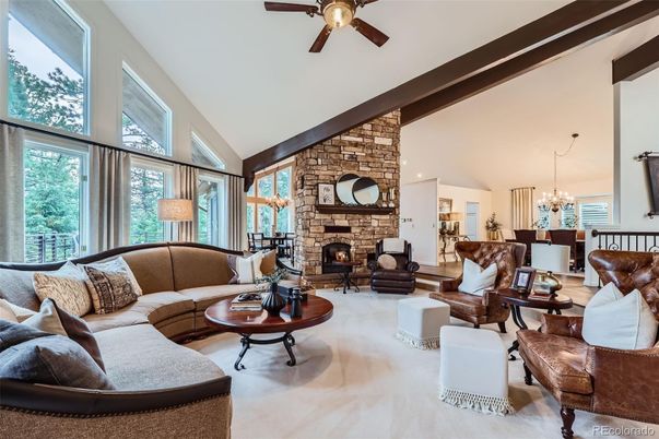Chandelier, Dining room, Fireplace, Interior, Living room, Stone Walls