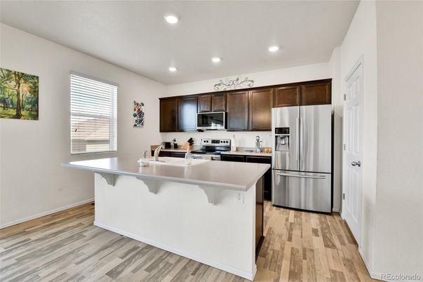 Interior, Kitchen, Recessed Lighting, Stainless Steel Appliances, Wood Texture Flooring