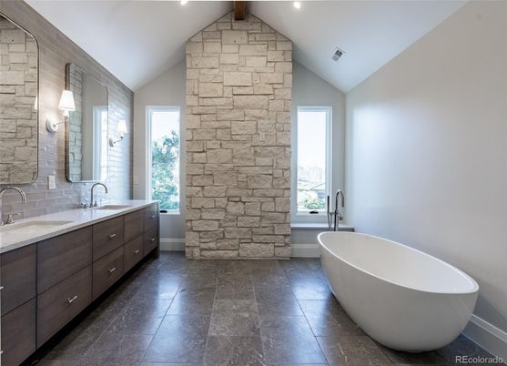 Bathroom, Dual Sink Vanities, Free Standing Baths, Interior, Recessed Lighting, Stone Walls