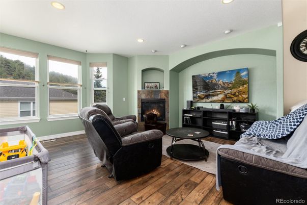 Fireplace, Interior, Living room, Recessed Lighting, Wood Texture Flooring