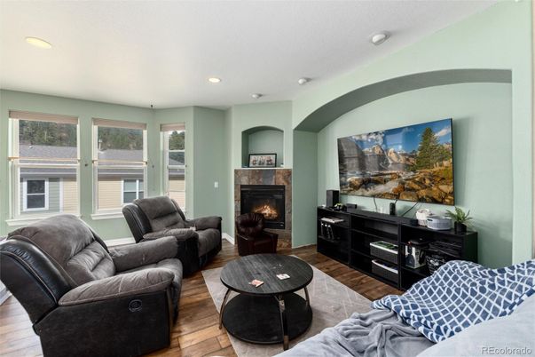 Fireplace, Interior, Living room, Recessed Lighting, Wood Texture Flooring