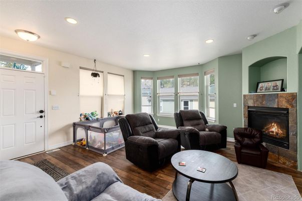 Fireplace, Interior, Living room, Recessed Lighting, Wood Texture Flooring