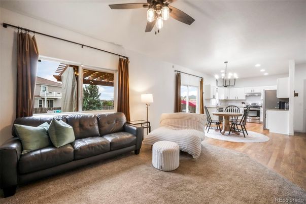 Chandelier, Dining room, Interior, Kitchen, Living room, Recessed Lighting, Stainless Steel Appliances, Wood Texture Flooring