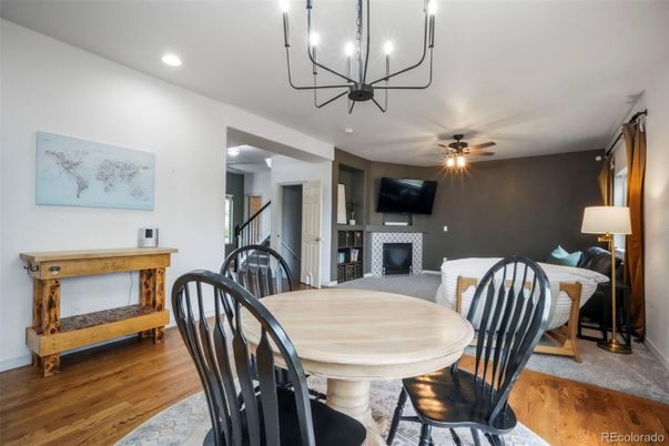 Chandelier, Dining room, Fireplace, Interior, Recessed Lighting, Wood Texture Flooring