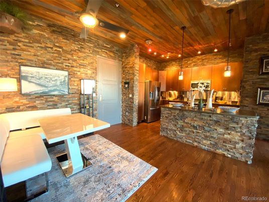Dining room, Interior, Kitchen, Pendant Lights, Recessed Lighting, Stainless Steel Appliances, Stone Walls, Wooden Ceilings, Wood Texture Flooring