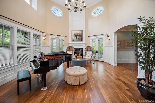 Chandelier, Fireplace, Interior, Living room, Piano, Wood Texture Flooring