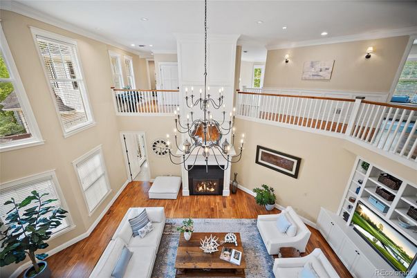 Chandelier, Fireplace, Interior, Living room, Recessed Lighting, Wood Texture Flooring